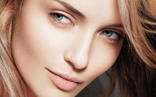 Blonde woman blowing wind hyperrealistic - shaded free wallpaper