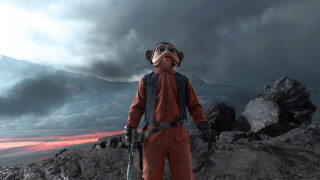 Man red suit helmet rocky - a dark sky in the background free wallpaper