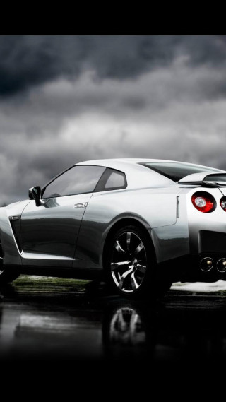 White sports car wet road 2 - grey background free wallpaper