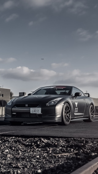 Black sports car cloudy sky 6 - matte finish free wallpaper