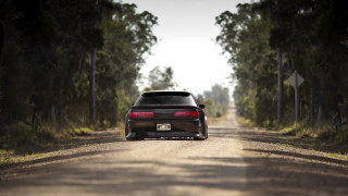 Car parked dirt road forest - scenery free wallpaper