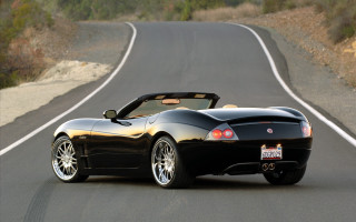 Black sports car driving road - a road next free wallpaper