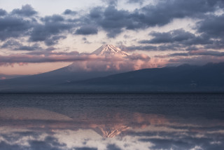 Mountain snow capped peak reflection - a cloudy sky free wallpaper
