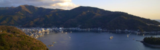 Lake mountains city skyline water - a sky line in the background free wallpaper