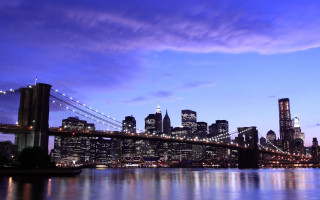 City skyline bridge river night 97 - a bridge and a river in front free wallpaper
