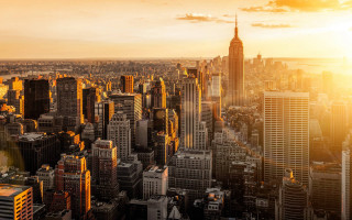 City skyline tall buildings sunset 4 - a yellow sky free wallpaper