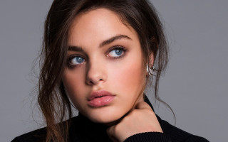 Woman blue eyes black sweater - a black sweater free wallpaper