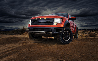Red truck dirt road cloudy - a black car in the foreground free wallpaper