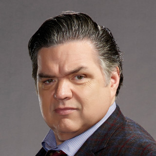 Man suit tie serious pose 3 - a suit free wallpaper