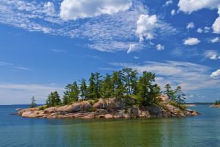 Small island with trees ocean - the middle of the ocean free wallpaper