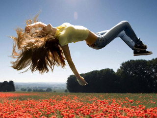Woman flying field flowers blue - surreal photography free wallpaper