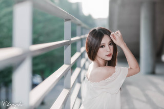 Woman balcony bangs browneyes whitedress - a balcony free wallpaper