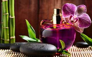 Perfume bottle bamboo mat orchid - a bottle of perfume free wallpaper