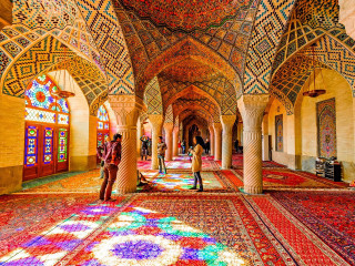 Large room colorful carpets arches - qajar art free wallpaper