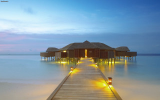 Pier wooden hut dusk lights - the water free wallpaper