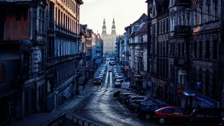 City street tall buildings clock - a few car free wallpaper