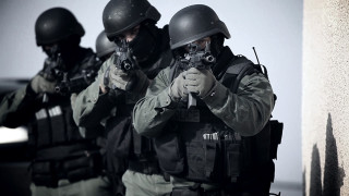 Military men guns aiming sky - a group of men free wallpaper