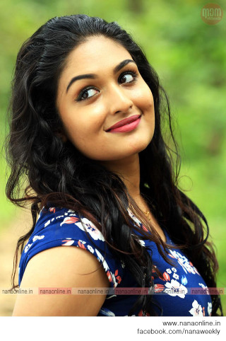 Woman blue dress smiling outdoors - movie still frame free wallpaper