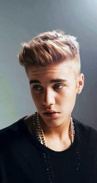 Young man short haircut serious - a young man free wallpaper