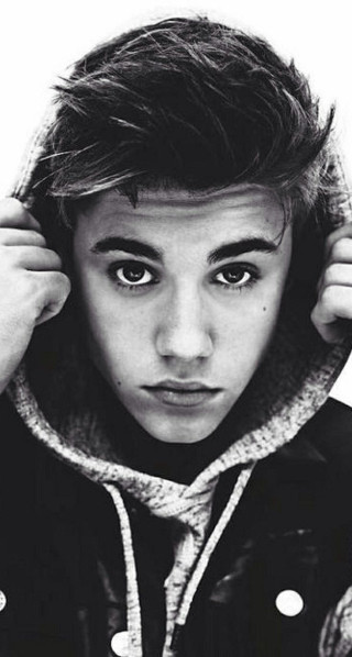 Young man hoodie serious face - a young man free wallpaper