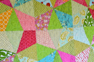 Colorful quilt swirly pattern flower - different color free wallpaper