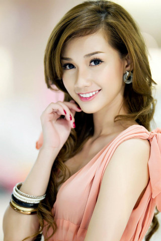 Woman pink dress posing hand - her chin free wallpaper