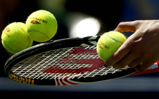 Tennis person holding racket balls - a person holding free wallpaper
