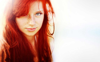 Freckled red haired blue eyed - a white wall free wallpaper
