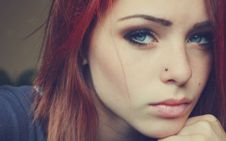 Redhair woman nosepiercing seriouslook blueeyes - red hair free wallpaper