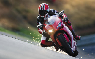 Red motorcycle rider water trees - a road next free wallpaper