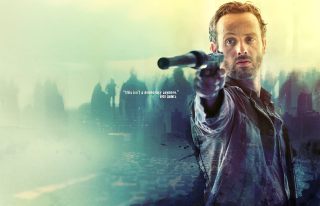 Man holding gun city background - andrew stevovich free wallpaper