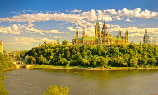 Castle hill river city clock 2 - a clock tower in the background free wallpaper