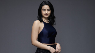 Woman black top skirt posing 2 - her right hand free wallpaper