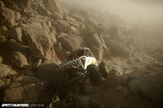 White yellow truck driving rocky - the rock free wallpaper