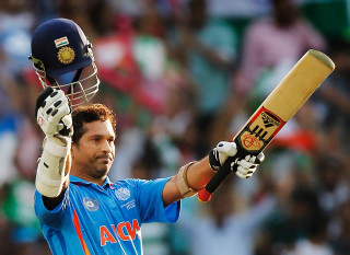 Man holding bat helmet gloves 3 - bholekar srihari free wallpaper