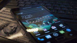 Cell phone money keyboard mouse - top of a pile free wallpaper