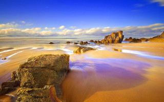 Rock sand beach blue sky - beautiful landscape free wallpaper