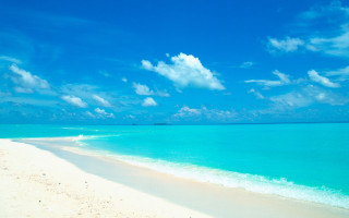 Beach blue sky white sand 4 - a boat in the distance free wallpaper