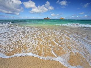 Sandy beach waves island sky - a sandy beach free wallpaper
