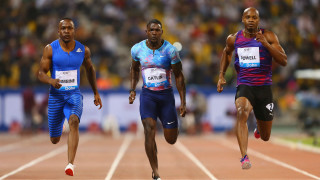 Three men running track stadium - official medium free wallpaper