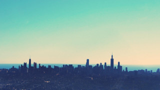 Plane city sunset tower skyline - over a city free wallpaper