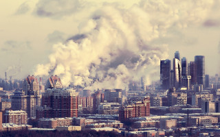 Smoky cityscape industrial buildings background - smoke free wallpaper for desktop