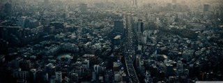 Cityscape night skyline skyscraper bridge - hazy free wallpaper