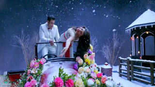 Man woman snow scene flowers - movie still free wallpaper