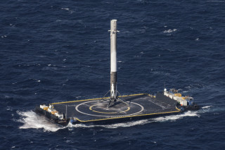 Small boat rocket ocean floating - a rocket free wallpaper