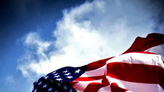 American flag flying sky clouds 2 - a large american flag free wallpaper