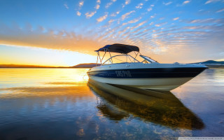 Boat sunset water sky clouds 8 - the water free wallpaper