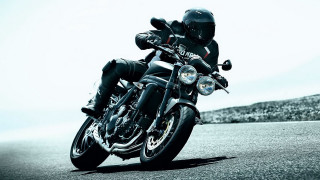 Man motorcycle snowy hillside sunny 2 - a hill side free wallpaper