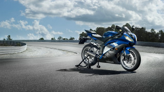 Blue motorcycle parked road hill - a blue motorcycle free wallpaper