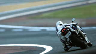 Motorcycle race track helmet rider - his head and a helmet free wallpaper